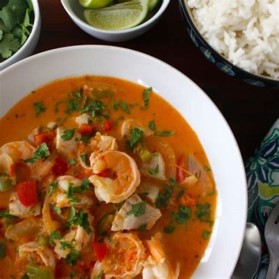  Moqueca: Een rijke seafood stoofpot met de frisse twang van limoen en kokosmelk!