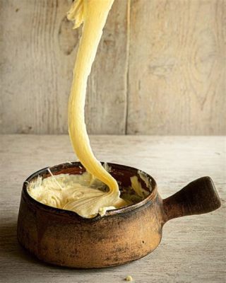  Aligot: Een Romige Kaasbom voor de Zintuigen die je Smeltgevoelens Ontketent!